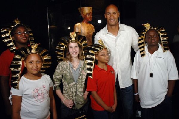 Miami Dolphins star Jason Taylor, second from right, poses with winners of a King Tut trivia contest from left, Lians Jean List, Taylor Brown, Judith Betancourt, Keytorri Partlow, and Stephen Pitts, far right next to a bust of Tutankhamun inside one of the galleries of the "Tutankhamun and the Golden Age of the Pharaohs" museum exhibition at the Museum of Art/Fort Lauderdale Wednesday April 5, 2006 in Fort Lauderdale, Fla.  Taylor surprised South Florida elementary through eighth grade students at the "Tutankhamun and the Golden Age of the Pharaohs" museum exhibition at the Museum of Art/Fort Lauderdale.  The Jason Taylor Foundation donated tickets to nearly 250 students from Mays Middle School, Sunland Park Elementary School and the Urban League of Miami-Dade to tour the exhibit, now in its final weeks.   The MoA/FL exhibition, second of four venues during its 27-month tour of the US and the only southeast destination, is organized by National Geographic, AEG Exhibitions, and Arts and Exhibitions International, with cooperation from the Egyptian Supreme Council of Antiquities, and locally sponsored by Blue Cross and Blue Shield of Florida.   (AP PHOTO/MUSEUM OF ART/FORT LAUDERDALE, David Adame)