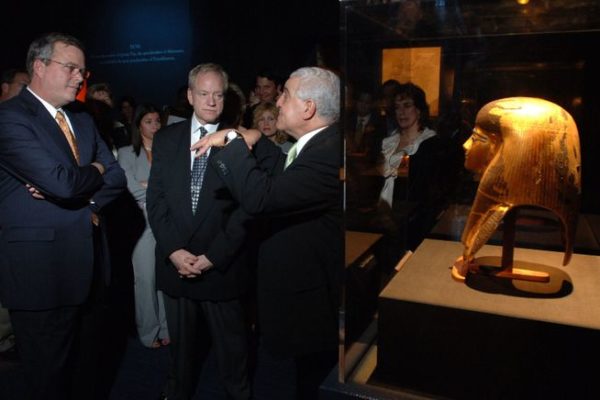 Florida Governor Jeb Bush, left, and Dr. David Silverman, national curator for "Tutankhamun and the Golden Age of the Pharaohs", center,  listen to Dr. Zahi Hawass, secretary general of Egypt's Supreme Council of Antiquities, right, explain the significance of the Funerary Mask of Tjuya, far right, during the VIP preview of the "Tutankhamun and the Golden Age of the Pharaohs" exhibition Wednesday, Dec. 14, 2005 at the Museum of Art/Fort Lauderdale in Fort Lauderdale, Fla.   The exhibition, sponsored by Northern Trust, opens its doors to the public December 15, 2005.  The second of four venues during its 27-month tour of the United States and the only southeast destination, the exhibition is organized by National Geographic, AEG Exhibitions, and Arts and Exhibitions International, with cooperation from the Egyptian Supreme Council of Antiquities, and locally sponsored by Blue Cross and Blue Shield of Florida.   (AP PHOTO/MUSEUM OF ART/FORT LAUDERDALE, David Adame)