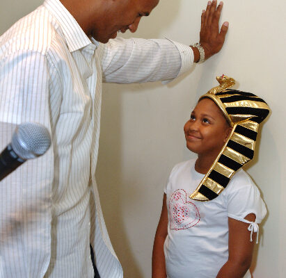 Miami Dolphins star Jason Taylor, left, chats with a starstruck Taylor Brown, right, one of the winners of a King Tut trivia contest at the "Tutankhamun and the Golden Age of the Pharaohs" museum exhibition at the Museum of Art/Fort Lauderdale Wednesday April 5, 2006 in Fort Lauderdale, Fla.  Taylor surprised South Florida elementary through eighth grade students at the "Tutankhamun and the Golden Age of the Pharaohs" museum exhibition at the Museum of Art/Fort Lauderdale.  The Jason Taylor Foundation donated tickets to nearly 250 students from Mays Middle School, Sunland Park Elementary School and the Urban League of Miami-Dade to tour the exhibit, now in its final weeks.   The MoA/FL exhibition, second of four venues during its 27-month tour of the US and the only southeast destination, is organized by National Geographic, AEG Exhibitions, and Arts and Exhibitions International, with cooperation from the Egyptian Supreme Council of Antiquities, and locally sponsored by Blue Cross and Blue Shield of Florida.   (AP PHOTO/MUSEUM OF ART/FORT LAUDERDALE, David Adame)